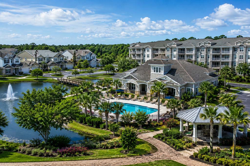 wide aerial photo of condo community
